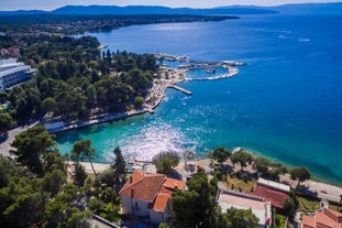 Photo of aerial view of Historic Adriatic town of Krk aerial view, Island of Krk, Kvarner bay of Croatia.