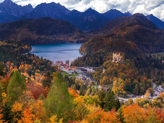 photo of view ofHohenschwangau Castle View from Neuschwanstein Castle 19th Century Neo-Romanesque Neo-Gothic Style Palace at Schwangau Füssen Ostallgäu Bavaria Germany Europe