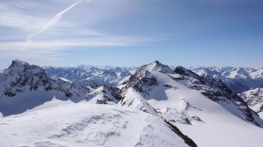 Photo of  beautiful Scuol town in Swiss Alps and Inn river, Switzerland.