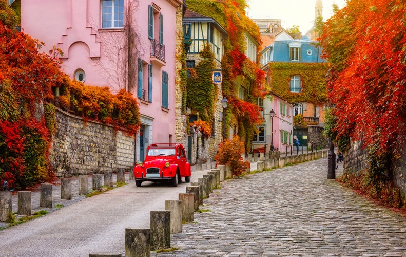 Cozy street in quarter Montmartre in Paris, France.