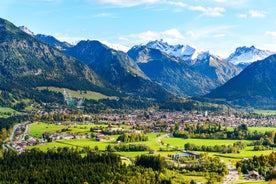 photo of aerial panoramic view of Oberstorf in Winter with snow in Bavaria, Germany.