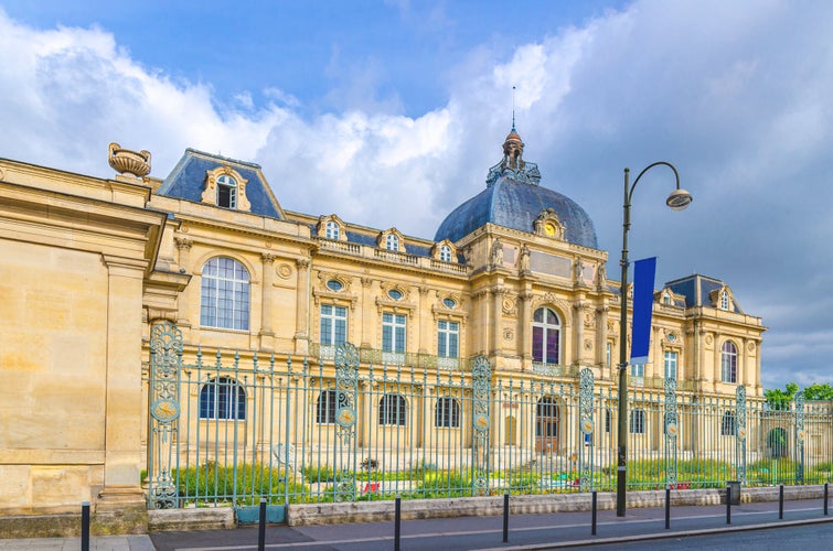 The Picardy Museum Musee de Picardie Second Empire style eclectic architecture style building in Amiens old historical city centre, blue sky background, Somme department, Hauts-de-France Region