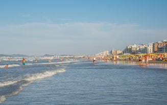 Photo of amazing landscape with beautiful sea beach on sunset in Viserbella, Italy.