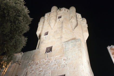 Photo of Clavero Tower in Salamanca, Spain, by night .