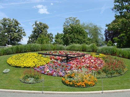Photo of flower clock or L'horloge fleurie is a symbol of the city watchmakers, located in Jardin Anglais park in Geneva city in Switzerland.
