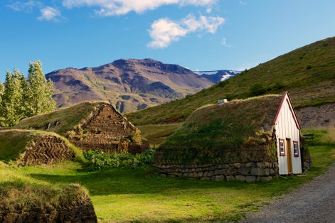 PHOTO OF Old traditional Icelandic farm with mossy roofs at Laufas.