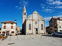 Photo of aerial view of town of Rovinj historic peninsula , famous tourist destination in Istria region of Croatia.