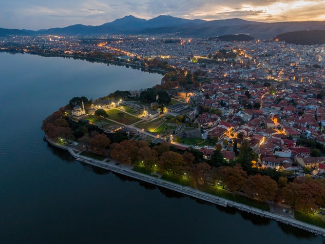 Photo of panoramic aerial view of the town and the Pamvotis lake, Ioannina in Greece.