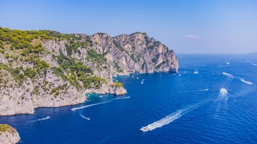 Photo of aerial morning view of Amalfi cityscape on coast line of Mediterranean sea, Italy.