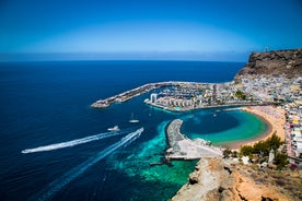 photo of landscape with Maspalomas town and golden sand dunes at sunrise, Gran Canaria, Canary Islands, Spain.