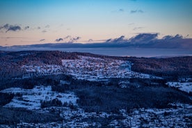 photo of beautiful vibrant aerial winter mountain view of ski resort Trysil, Norway. sunny winter day with slope, piste and ski lift.