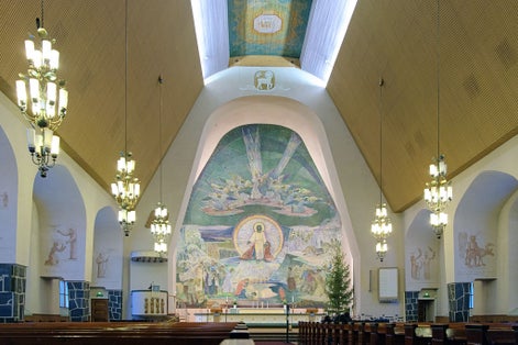 Interior of the Rovaniemi Church with altar fresco "The Source of Life" in Rovaniemi, Finland. The fresco made in 1951 by Lennart Segerstrale.