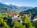 Photo of aerial View of the Medieval Town of Gruyeres, Famous Castle of Gruyeres, Canton of Fribourg, Switzerland.