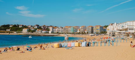 Photo of cityscape of French border town Hendaye, as seen from Spanish Hondarribia, with Famous Rhune Mount at Background, France.