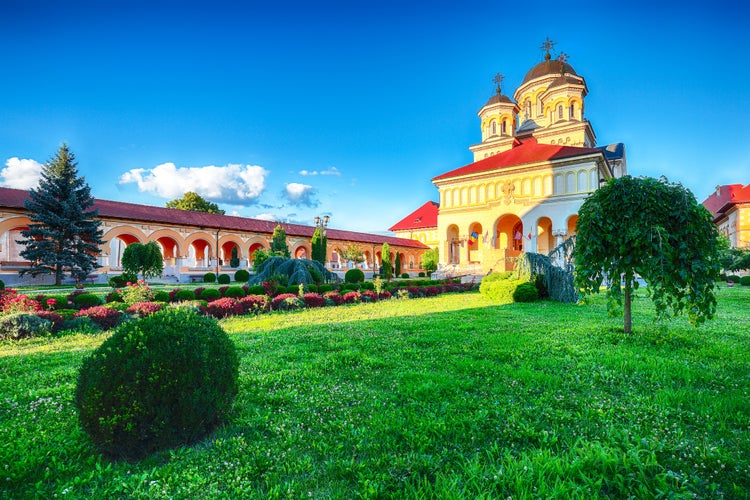 photo of view of The Coronation Orthodox Cathedral in Fortress of Alba Iulia. Dramatic summer scene of Transylvania, Alba Iulia city, Romania, Europe