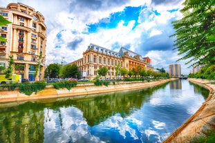 Antique building view in Old Town Bucharest city - capital of Romania and Dambrovita river. Bucharest, Romania, Europe.