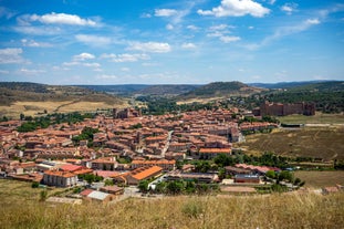 photo of summer view of Teruel with landmarks (Cathedral of Santa María de Mediavilla, Mausoleum of the Amantes) in Aragon, Spain.