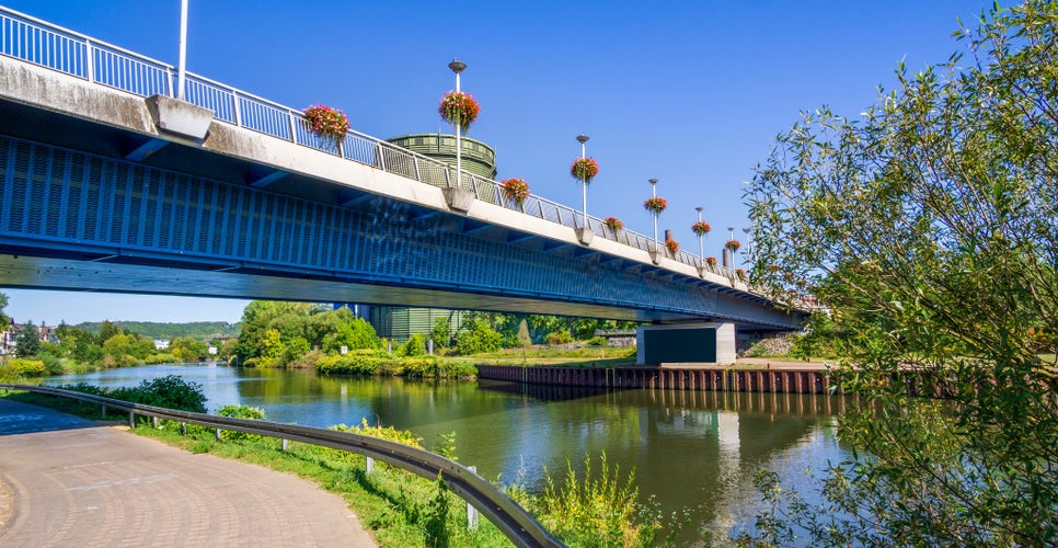 Photo of bridge völklingen wehrden in the summer decorated with flower boxes.Germany.