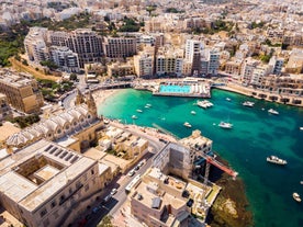 Photo of beautiful aerial view of the Spinola Bay, St. Julians and Sliema town on Malta.