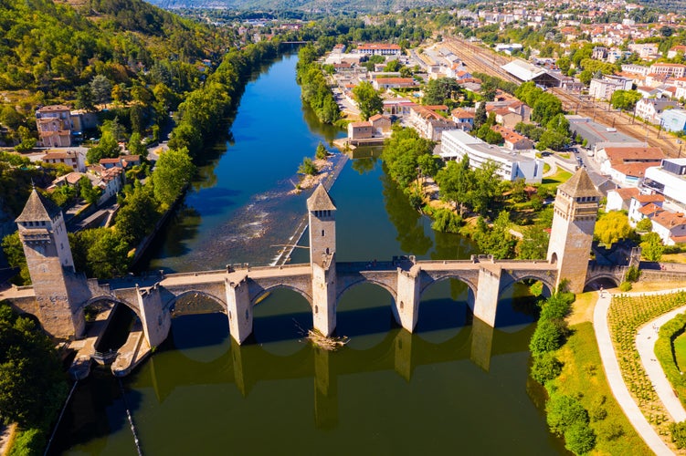 Photo of aerial view of Pont Valentre bridge across the Lot River in Cahors, France.