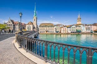 View of the Old Town of Basel with red stone Munster cathedral and the Rhine river, Switzerland.