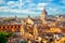 Aerial panoramic cityscape of Rome, Italy, Europe. Roma is the capital of Italy. Cityscape of Rome in summer. Rome roofs view with ancient architecture in Italy. 