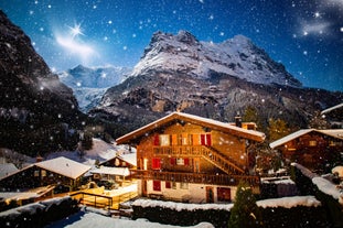 photo of Winter landscape in Grindelwald at sunrise, behind the Mittelhorn and Wetterhorn, Wetterhorn, Interlaken-Oberhasli, Bernese Oberland, Canton of Bern, Switzerland.