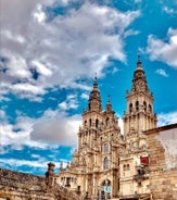 Photo of Facade of Santiago de Compostela cathedral in Obradoiro square, Spain.