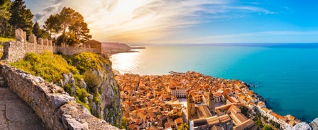 Photo of view of Cefalu and Promontorio de Torre Caldura seen from Norman Castle, La Rocca park, Italy.