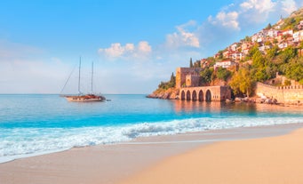 Photo of Kizil Kule or Red Tower and port aerial panoramic view in Alanya city, Antalya Province on the southern coast of Turkey.