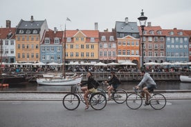 Scenic summer view of Nyhavn pier with color buildings, ships, yachts and other boats in the Old Town of Copenhagen, Denmark