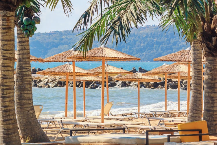 Photo of the beach umbrellas and loungers, city of Varna, on the Black Sea coast of Bulgaria.