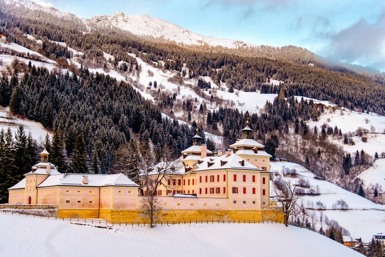 Wolfsthurn Castle covered by snow in winter - Mareta Racines Vipiteno - Bolzano - Trentino Alto Adige South Tyrol Italy.