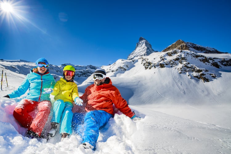 photo of ski, winter, snow - family enjoying winter vacation in Zermatt, Switzerland.