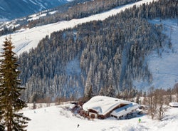 Photo of aerial view over Saalbach village in summer, Austria.