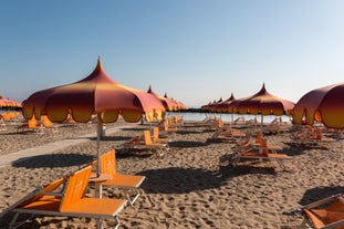 Photo of amazing landscape with beautiful sea beach on sunset in Viserbella, Italy.