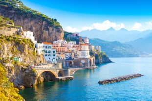 Photo of aerial morning view of Amalfi cityscape on coast line of Mediterranean sea, Italy.