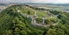 Photo of Aerial panorama of medieval Saris castle with towers, bastions, walls, gates and a donjon in Slovakia.