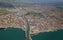 Photo of aerial view of the Tyrrhenian coastline and Fiumicino town, Lazio, Italy.