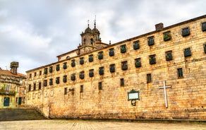 Photo of Facade of Santiago de Compostela cathedral in Obradoiro square, Spain.