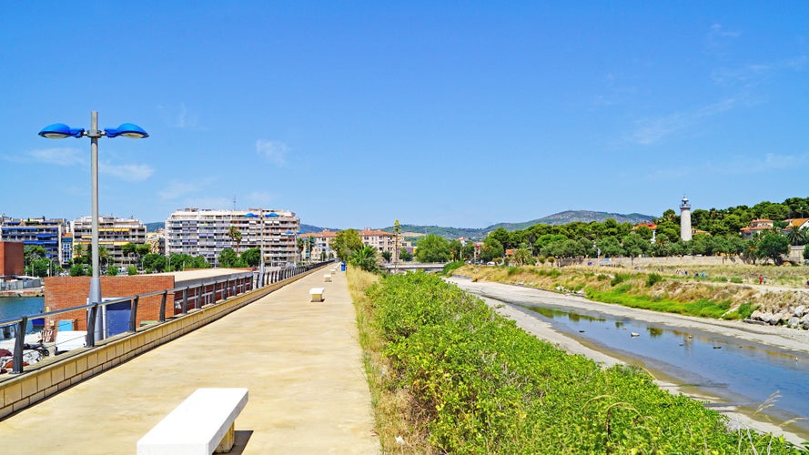 Photo of Port and lighthouse of Sant Cristofol in Vilanova i la Geltru in Barcelona, Catalunya, Spain.