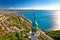 Photo of Trieste lighthouse Phare de la Victoire and cityscape panoramic aerial view, Friuli Venezia Giulia region of Italy.