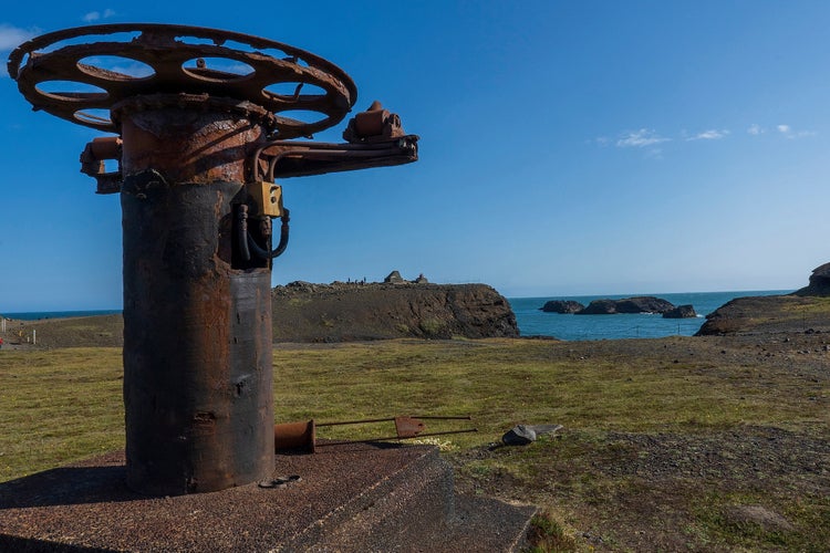 photo of view of Cliffs at the Dyrhólaey Peninsula, Iceland on the tip of Iceland's southern coast, Southern Peninsula, Iceland.