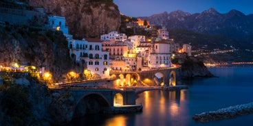 Photo of aerial morning view of Amalfi cityscape on coast line of Mediterranean sea, Italy.