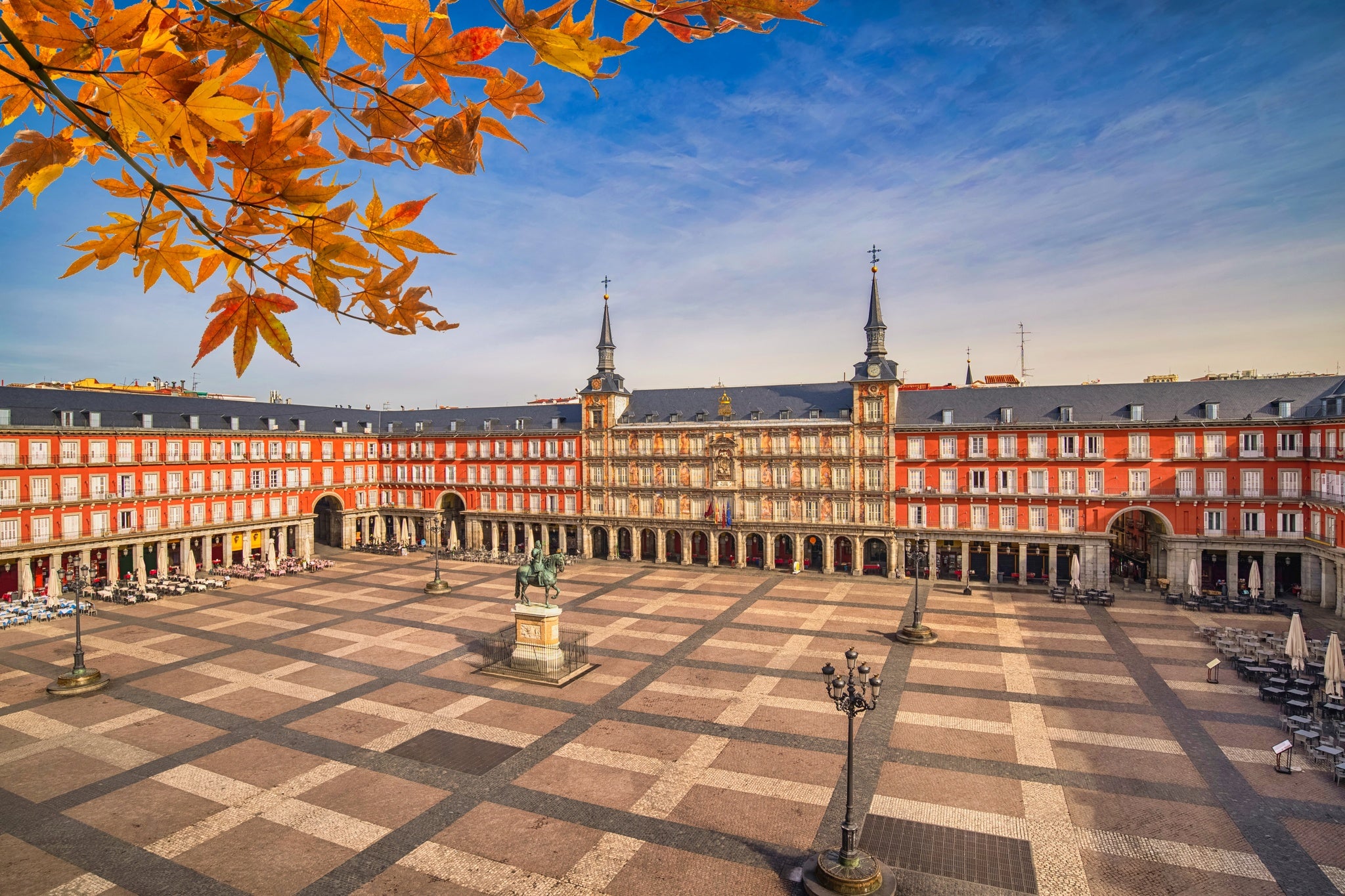 Madrid Spain, city skyline at Plaza Mayor with autumn leaf foliage.jpg