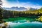 Sunny morning in Lake Carezza / Lago di Carezza / Karersee in Dolomites (Dolomiti), South Tyrol, Italy.