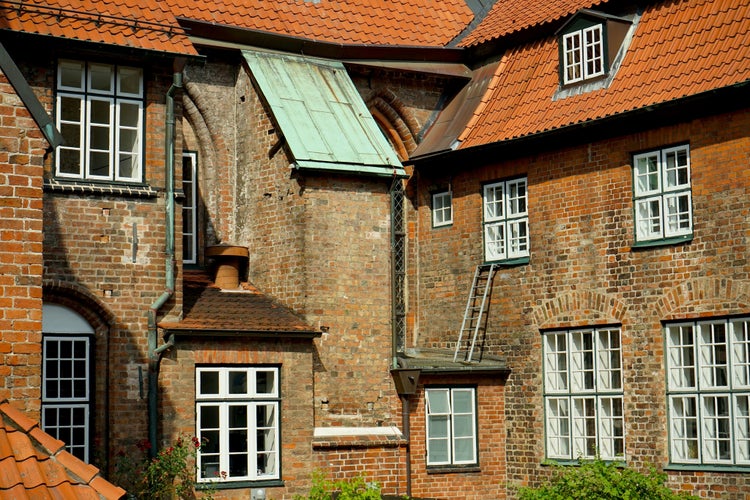 photo of view of streets with old houses in Lübeck, Germany.