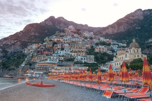 Photo of aerial morning view of Amalfi cityscape on coast line of Mediterranean sea, Italy.