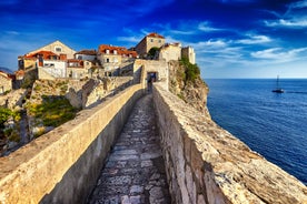 Photo of panorama and landscape of Makarska resort and its harbour with boats and blue sea water, Croatia.