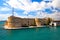 photo of Aragonese Castle of Taranto and revolving bridge on the channel between Big and Small sea, Puglia, Italy, Blue sunny sky